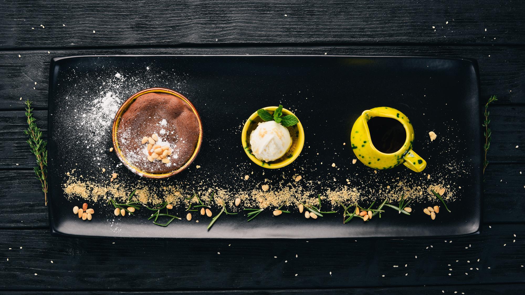 assorted plated appetizers on slate